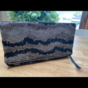 Brand new Stella and Dot Metallic Knit Clutch
